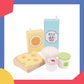 Vue rapprochée d'un kit de cuisine Montessori avec aliments en bois