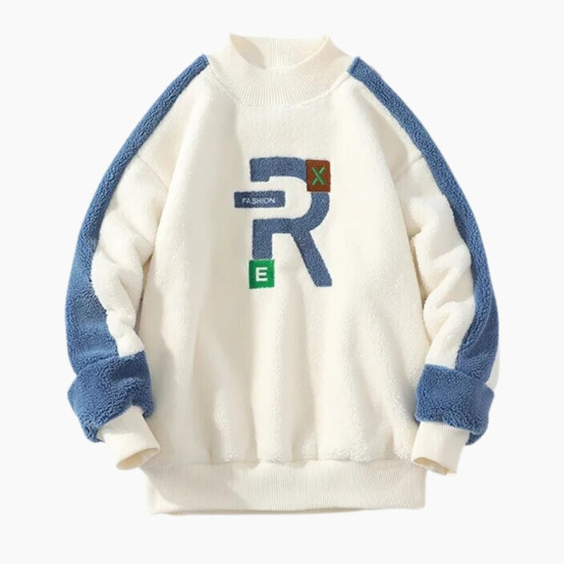 Détail des manches bleues du pull d'hiver en Pilou Pilou