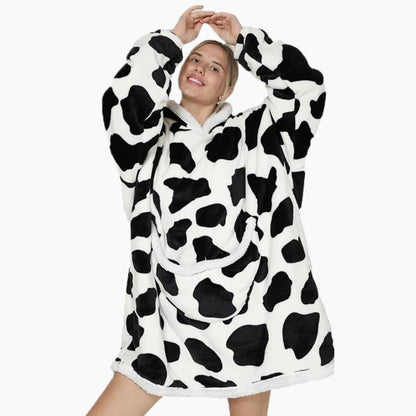 Vue de face d'un pull plaid vache avec poche kangourou