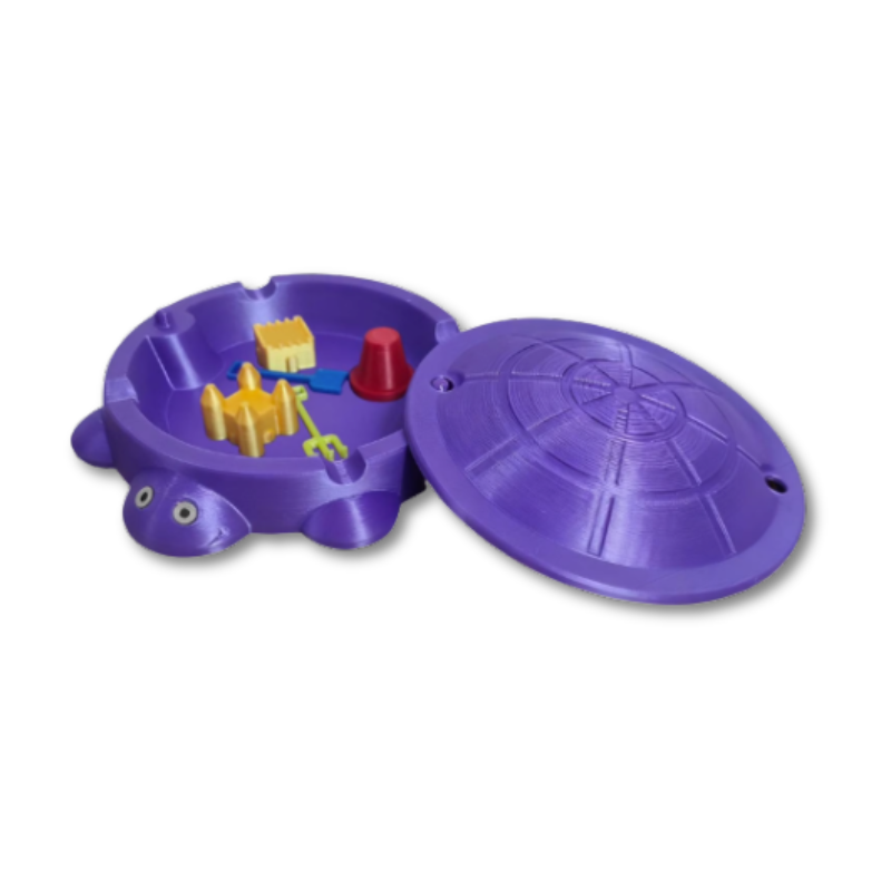 Sandbox sensoriel violet avec formes et seau