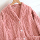 Vue de face du pyjama rose avec poches pratiques