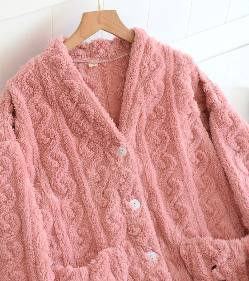 Vue de face du pyjama rose avec poches pratiques