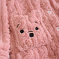 Détail des motifs croisés sur le tissu Pilou rose