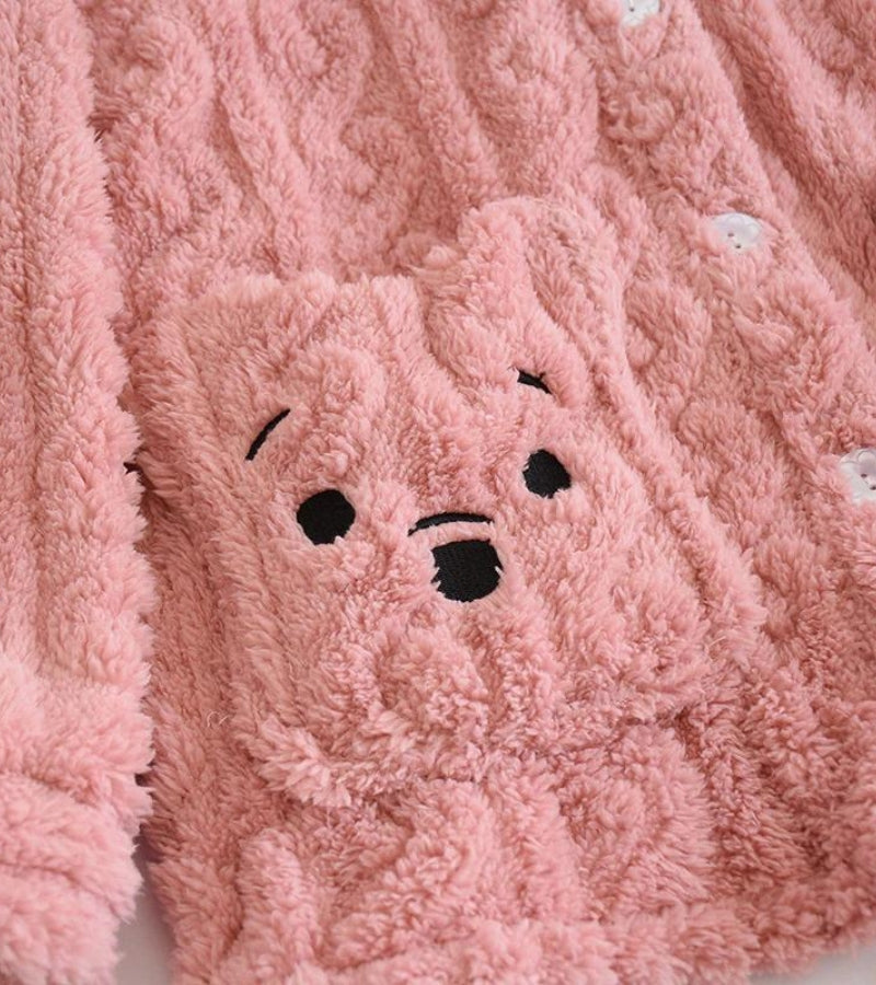 Détail des motifs croisés sur le tissu Pilou rose