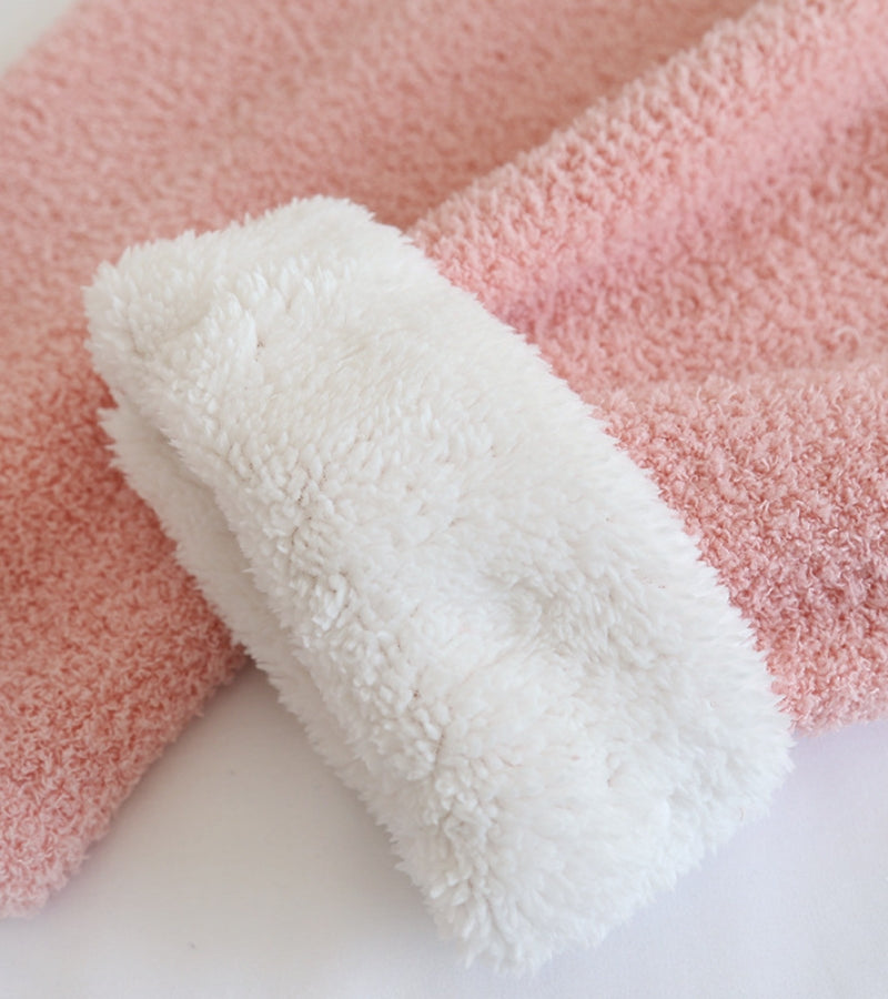 Zoom sur la texture douce et moelleuse du Pilou