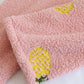 Vue de dos du pyjama, montrant l'harmonie des motifs