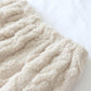 Zoom sur le tissu flanelle à motifs croisés