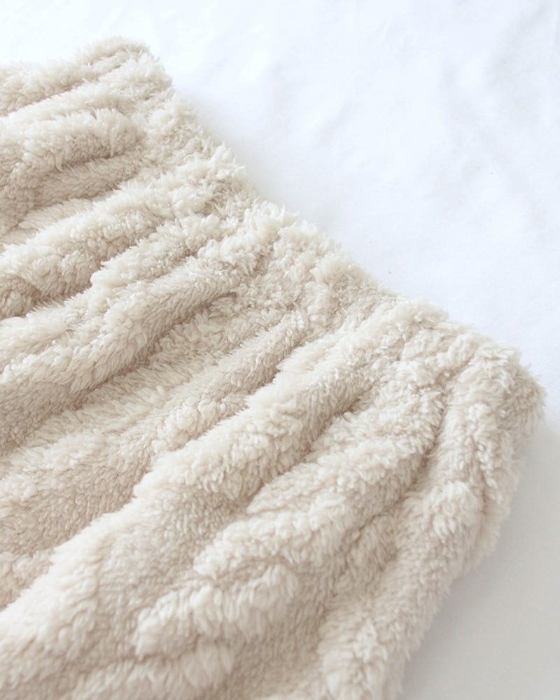 Zoom sur le tissu flanelle à motifs croisés