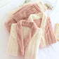 Ensemble pyjama crème avec poches et touches de rose