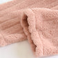 Ensemble pyjama rose et crème, matière douce et chaude