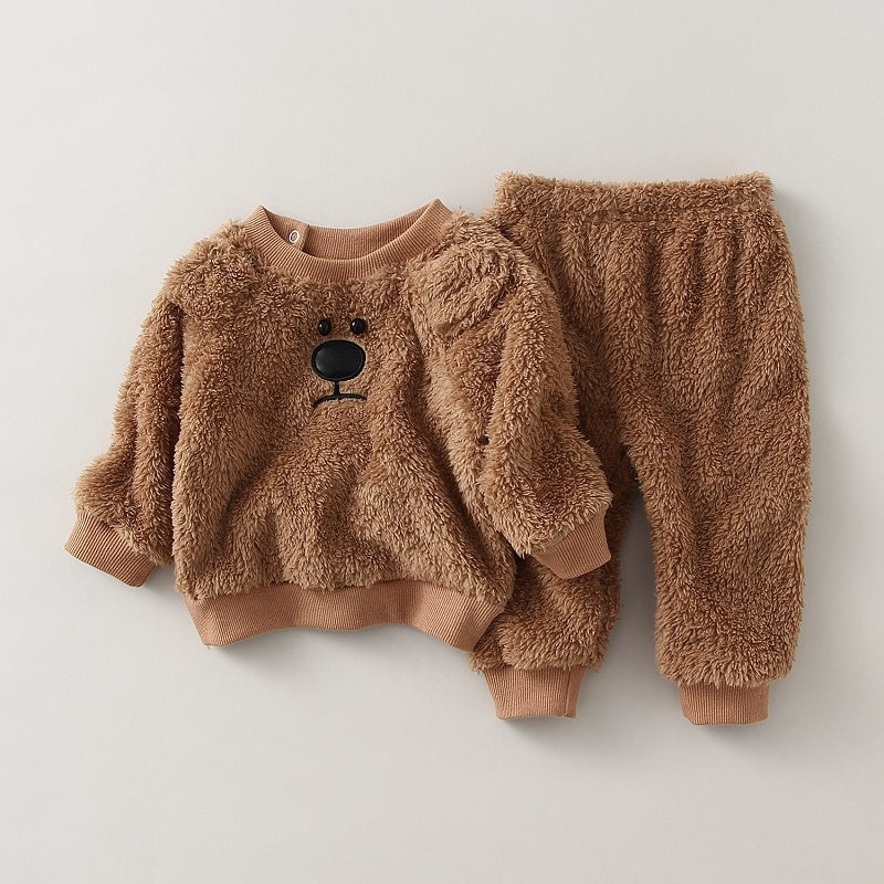 Vue de dos d'un pyjama polaire enfant avec capuche