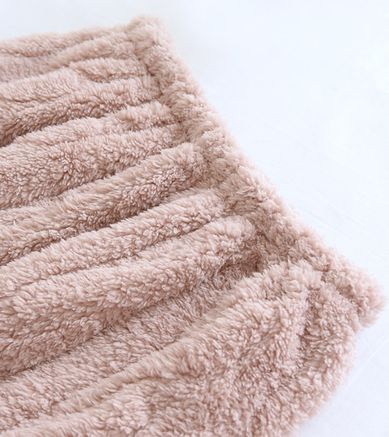 Détail des poches du pyjama rose en matière torsadée