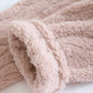 Gros plan sur la texture douce du pilou pilou rose