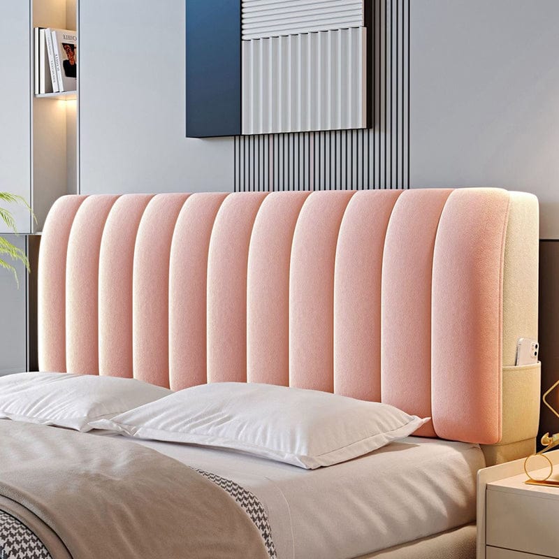 Housse de lit rose installée, montrant son ajustement parfait