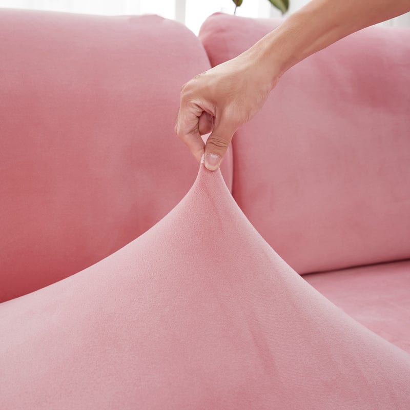 Détail de la couture d'une housse en velours rose