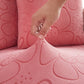 Housse polaire rose avec motif floral sur coussin de canapé
