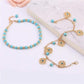 Bracelets de cheville dorés avec pierres turquoise et charmes floraux