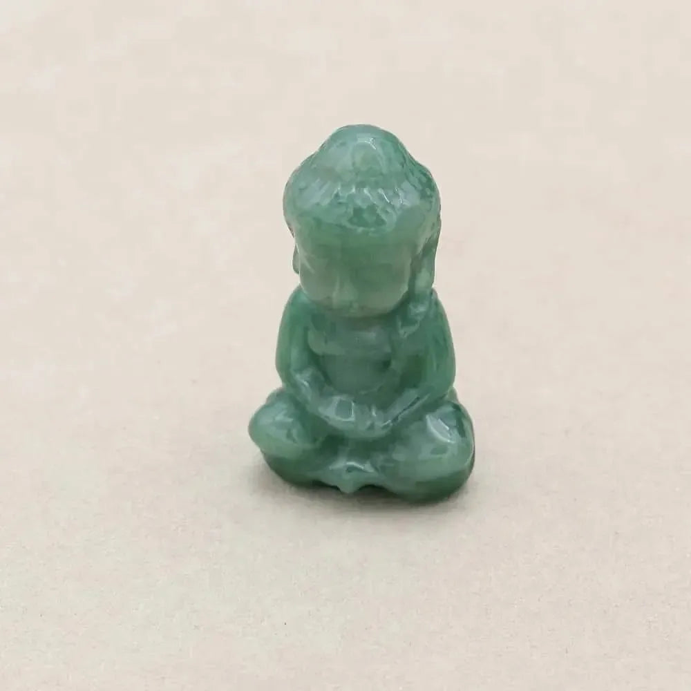 Vue rapprochée d'un Bouddha en pierre, texture visible