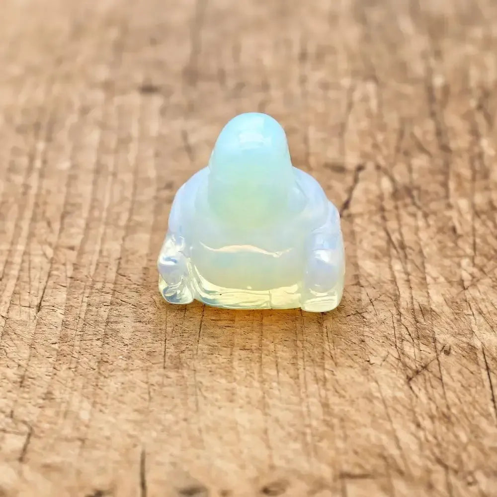 Statue de Bouddha rieur en quartz rose, stimulant la joie de vivre