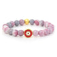 Mala et bracelet en rhodonite pour méditation et équilibre