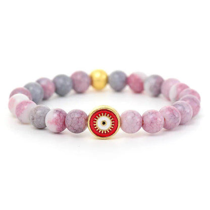 Mala et bracelet en rhodonite pour méditation et équilibre