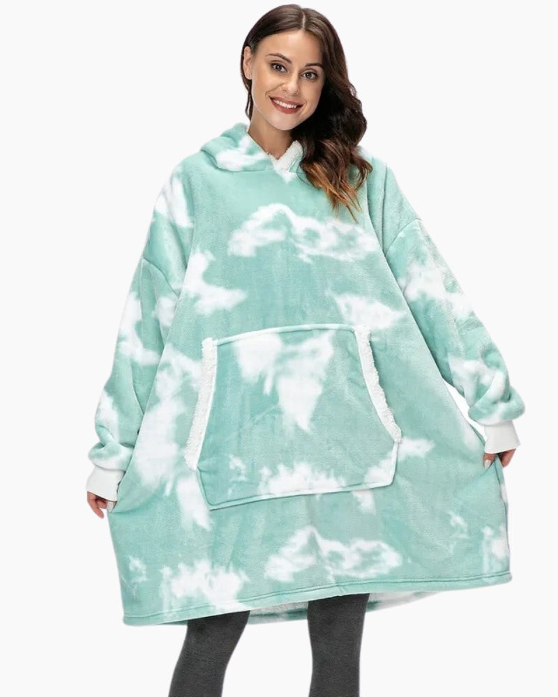 Gros plan sur la matière douce du sweat plaid