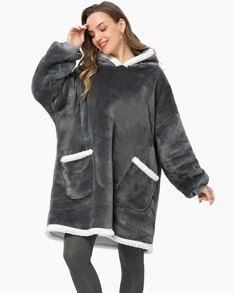 Détail des poignets élastiques du sweat plaid