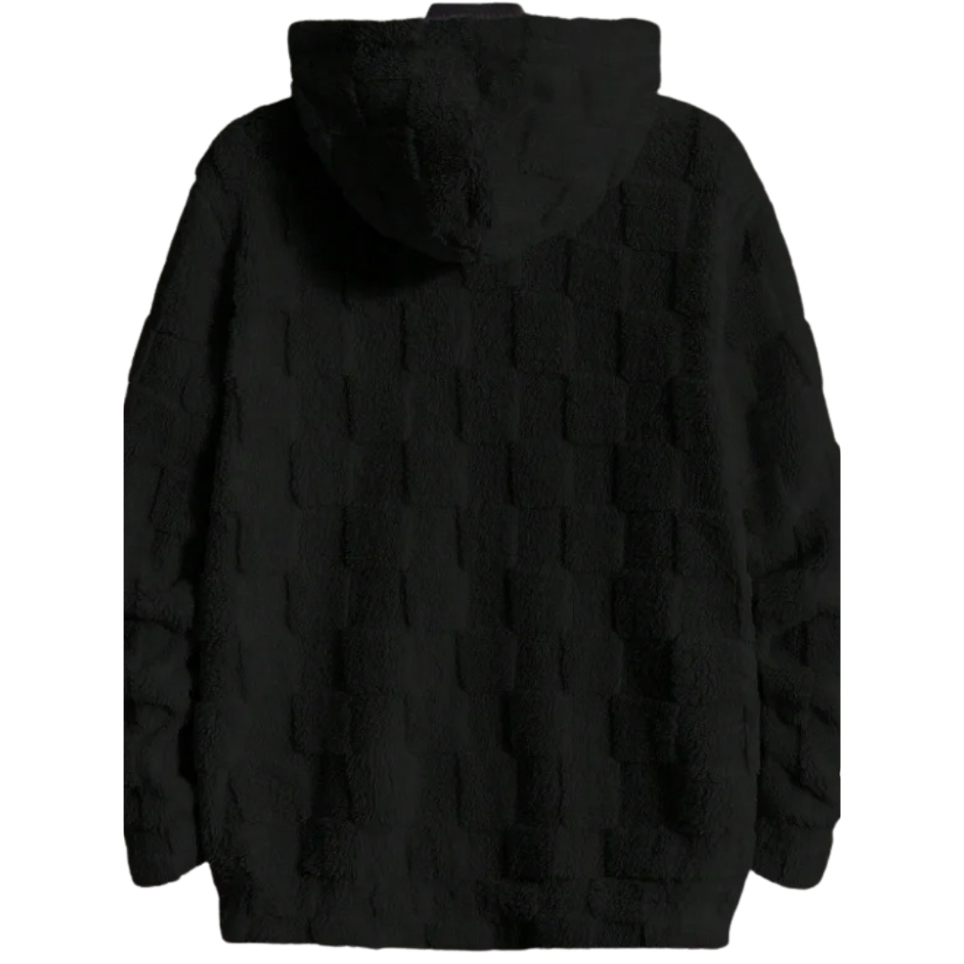 Gros plan sur la matière Pilou Pilou noire du sweat