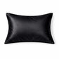 Taie d'oreiller noire en soie sur fond blanc