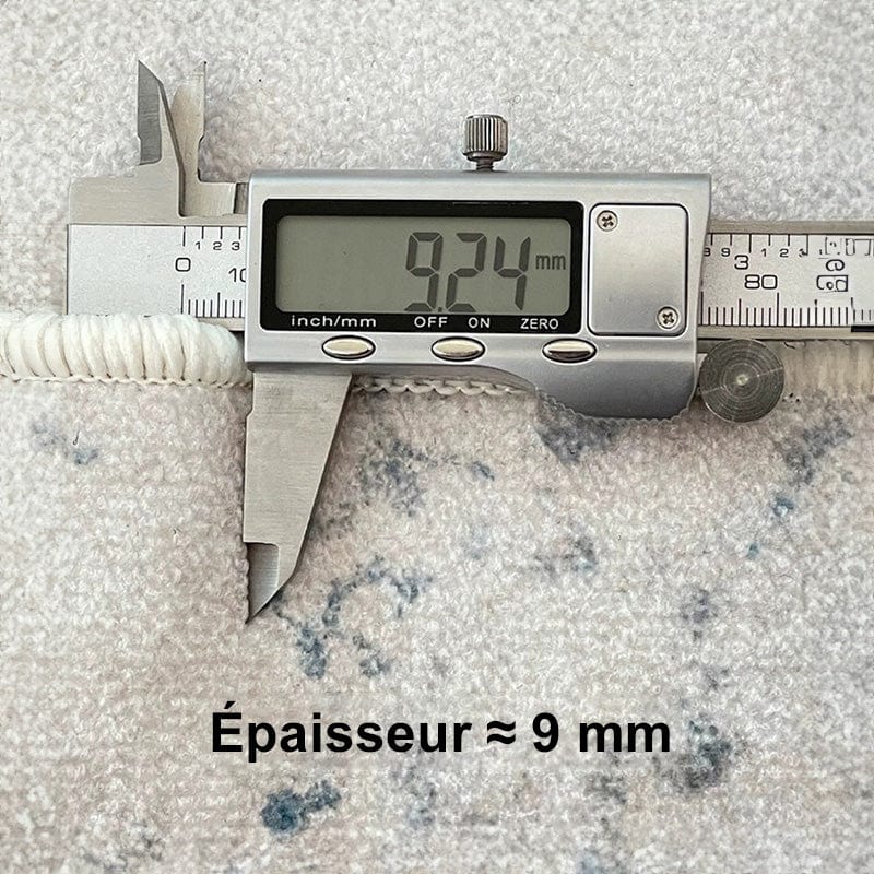 Vue de dessus d'un tapis beige, surface moelleuse
