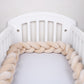 Gros plan sur la texture velours de la tresse beige