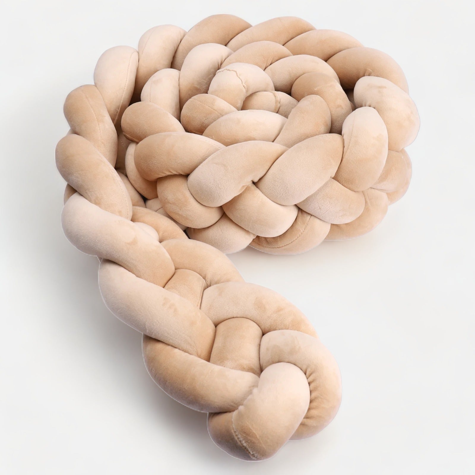 Tresse de lit beige ajoutant une touche décorative