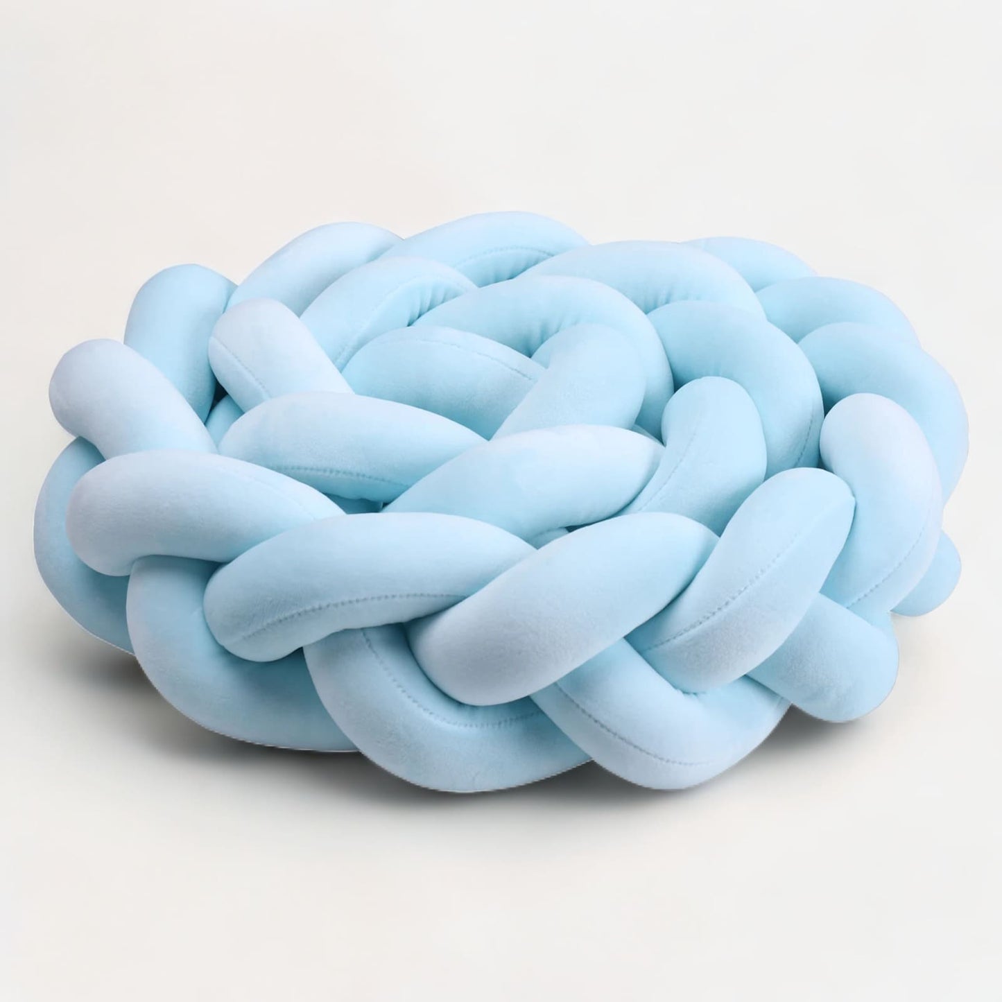 Gros plan sur la texture velours de la tresse bleue