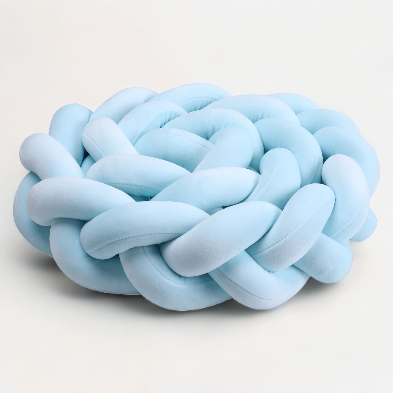 Gros plan sur la texture velours de la tresse bleue