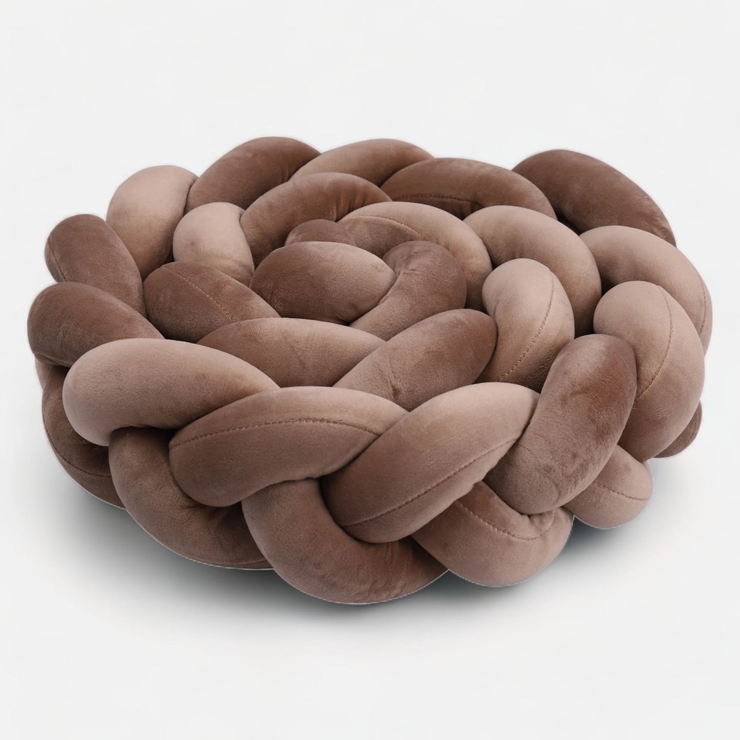Tresse de lit marron entourant un lit bébé