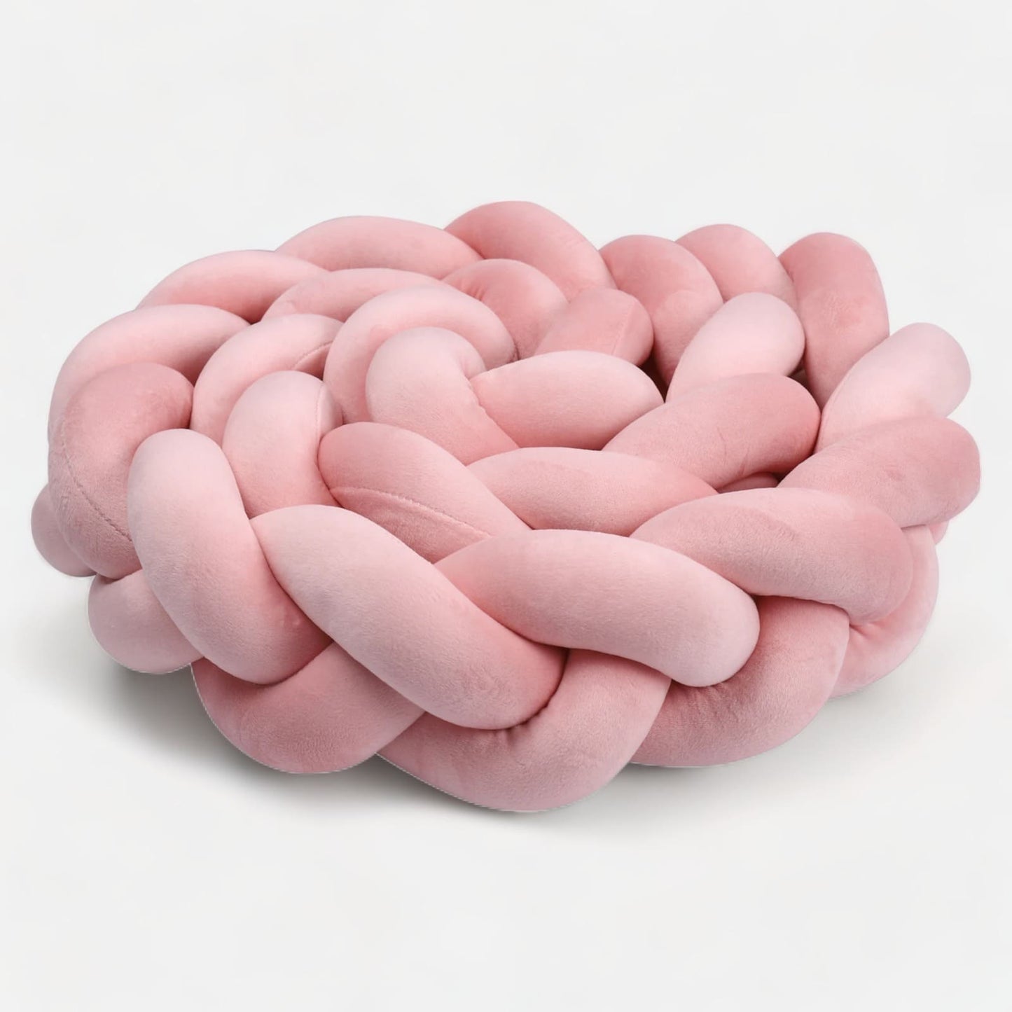 Vue latérale de la tresse rose protégeant le lit