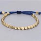 Ensemble de bracelets tibétains, fil bleu et cuivre