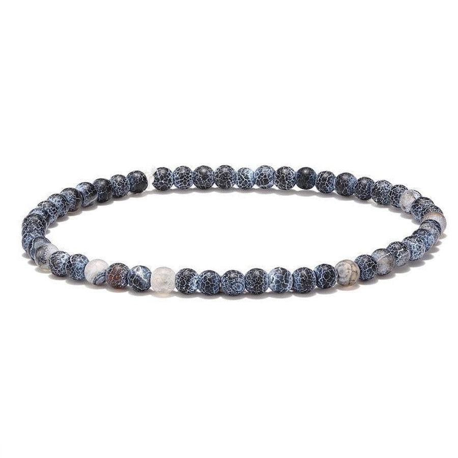 Gros plan sur nœud coulissant du bracelet tissé