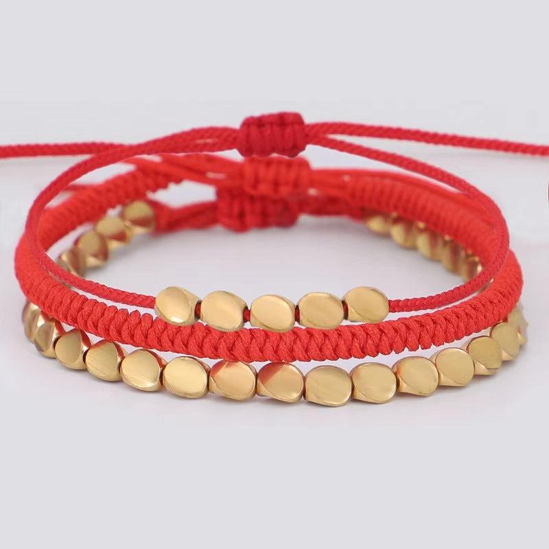Bracelet tibétain rouge tressé avec nœud de la chance