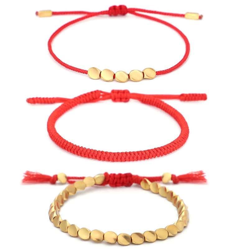 Bracelets tibétains rouges enroulés, symboles de protection