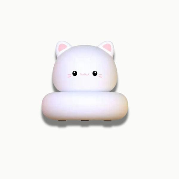 Enfant touchant une veilleuse chat lumineuse ajustable