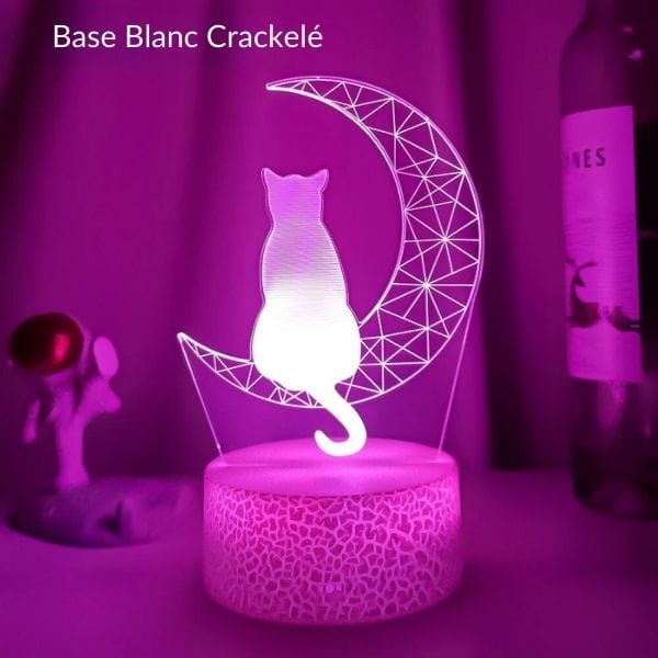 Veilleuse 3D chat et lune allumée sur table de nuit