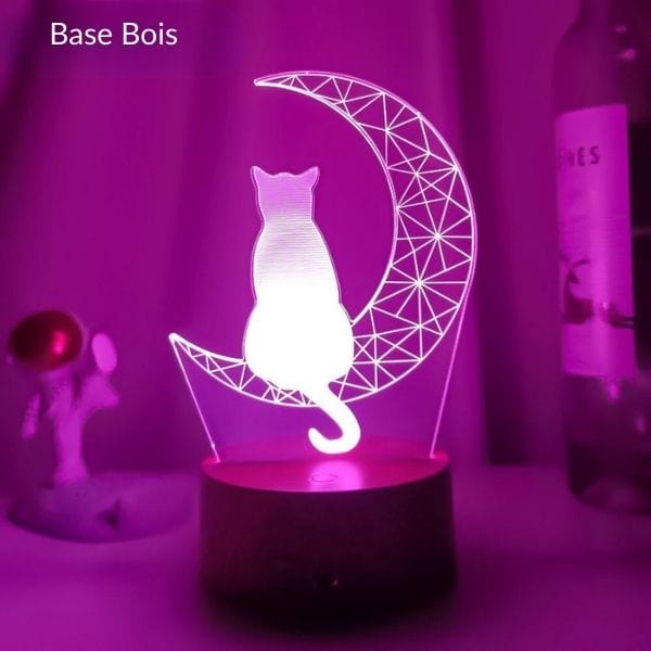 Vue rapprochée de la veilleuse LED avec base en bois