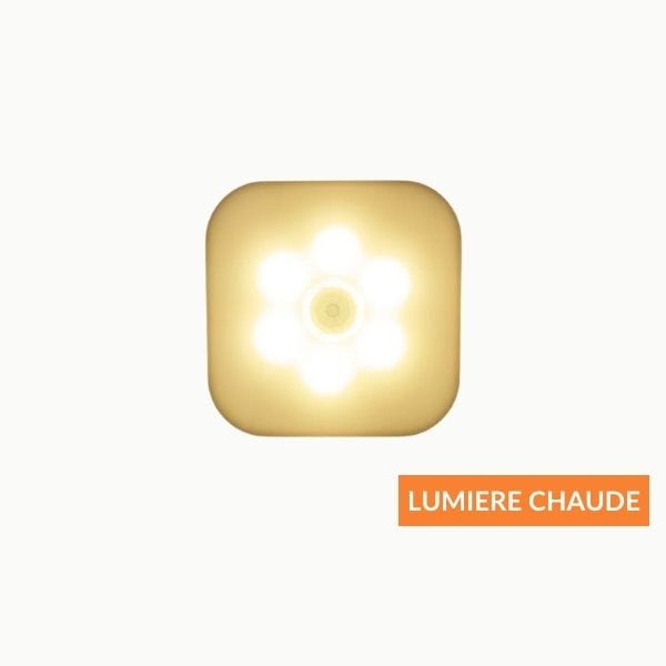 Éclairage chaud de la veilleuse dans une chambre
