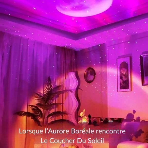 Veilleuse projetant des étoiles colorées sur un mur sombre