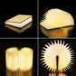 Veilleuse LED blanche pliée, design livre, sur fond neutre