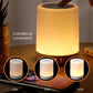Veilleuse Bluetooth avec lumière LED multicolore sur table de nuit