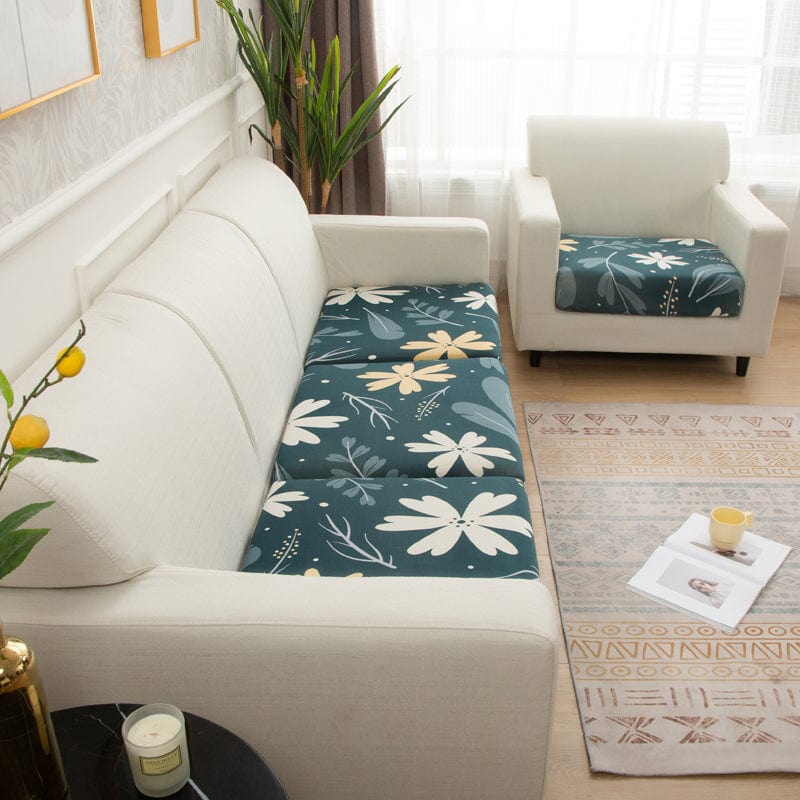 Détail du motif floral sur housse de coussin verte