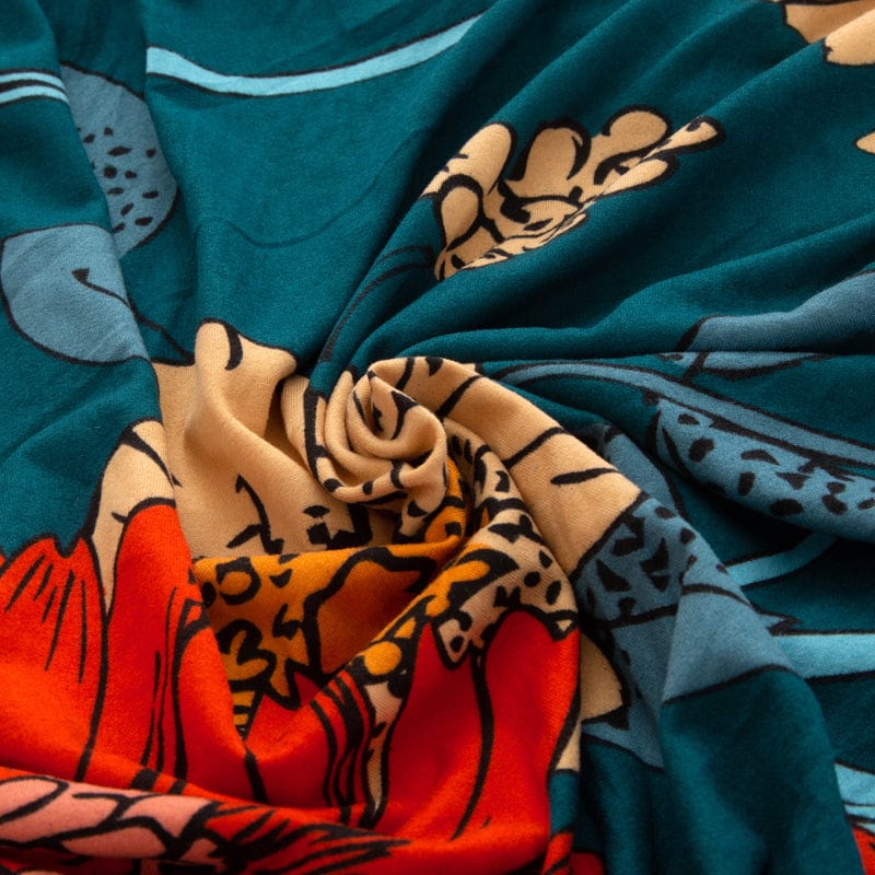 Housse de coussin verte, détail du motif floral