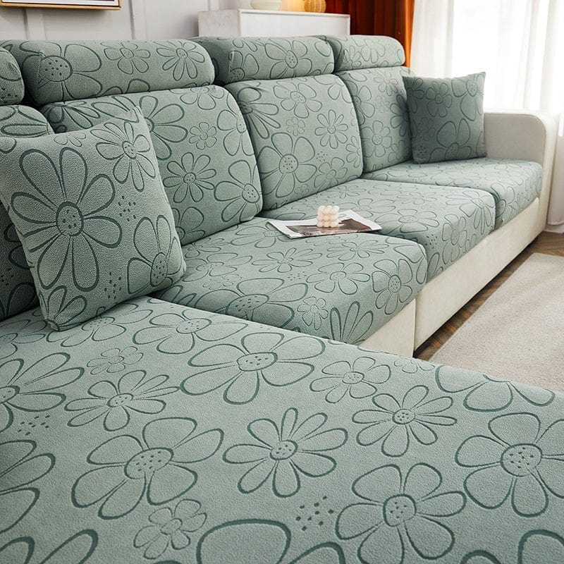 Housse extensible ajustée sur un coussin, motif floral visible
